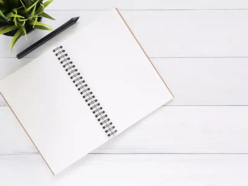 A notebook and pen