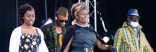 four artists on a stage