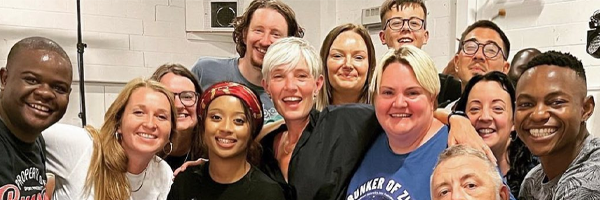 a group of smiling people